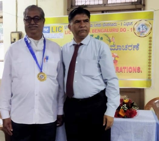 K.Gangadhar being felicitated by Branch Manager- Mr. A.Bhaskar for winning in Insurance week Competition.
